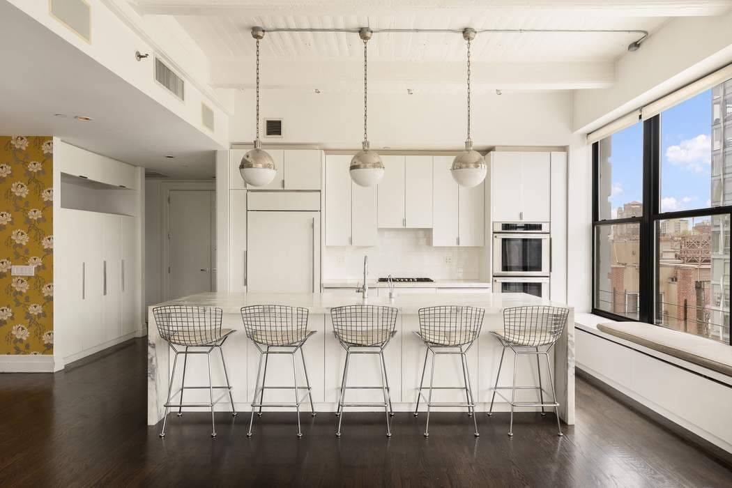 Situated on the northwestern corner of the coveted Sweeney Building, this sprawling 2, 474 sq.