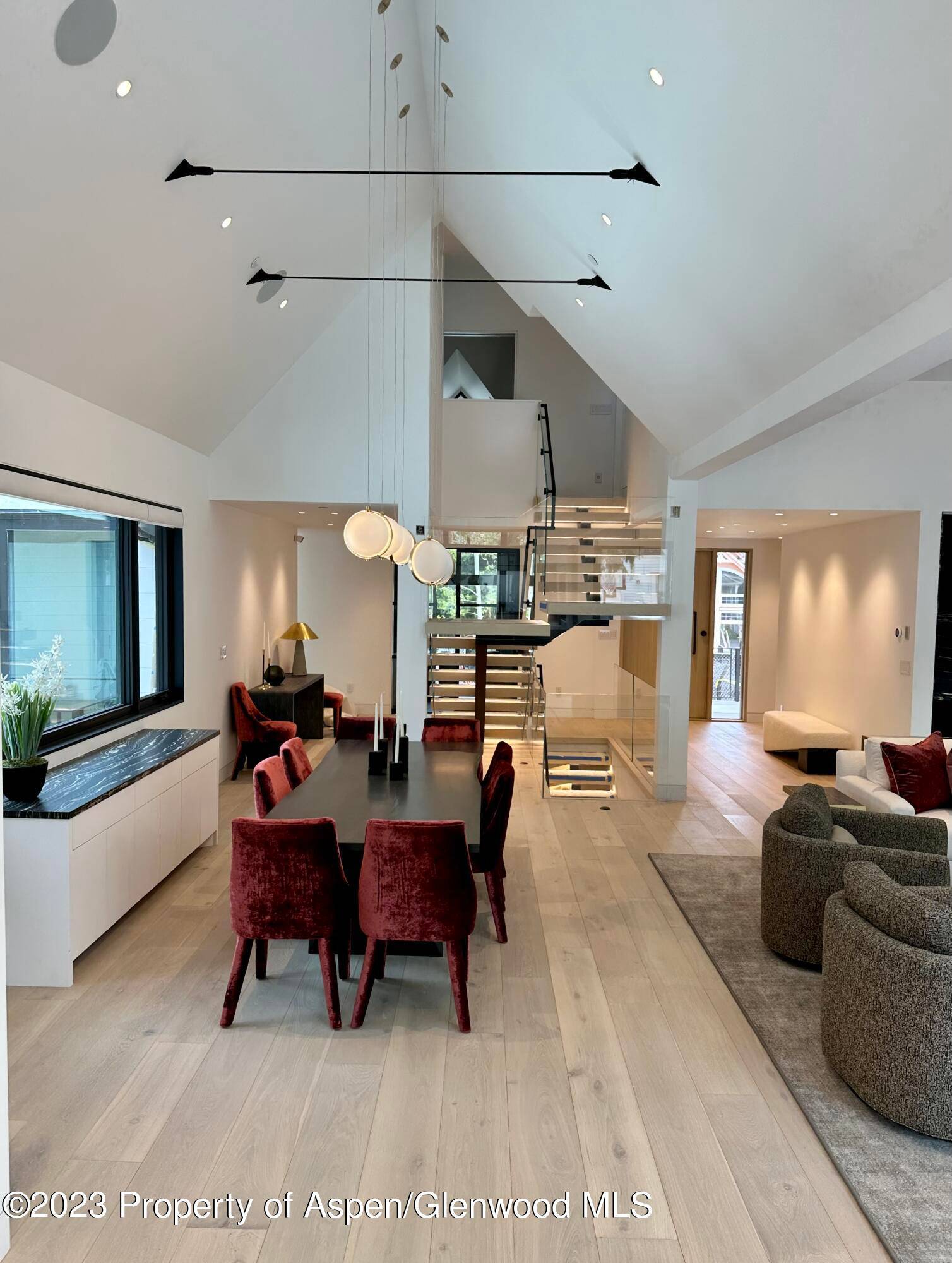 Own this stunning home with extraordinary natural light and mountain views in Aspen's desirable West End.