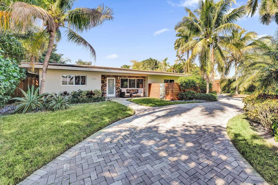 Impeccably renovated pool home in the heart of Coral Ridge.