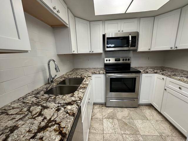 Recently remodeled 2 2 condo is centrally located in PBG new laminate floors living room and 2 bedrooms, new kitchen cabinets with lazy Susan, new kitchen counter tops, new bathrooms' ...