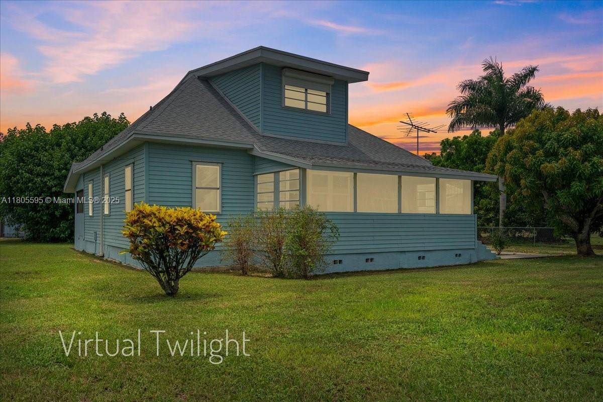 REDUCED ! ! ! Charming 2 story 4BR 2BA Old Florida home on 1.