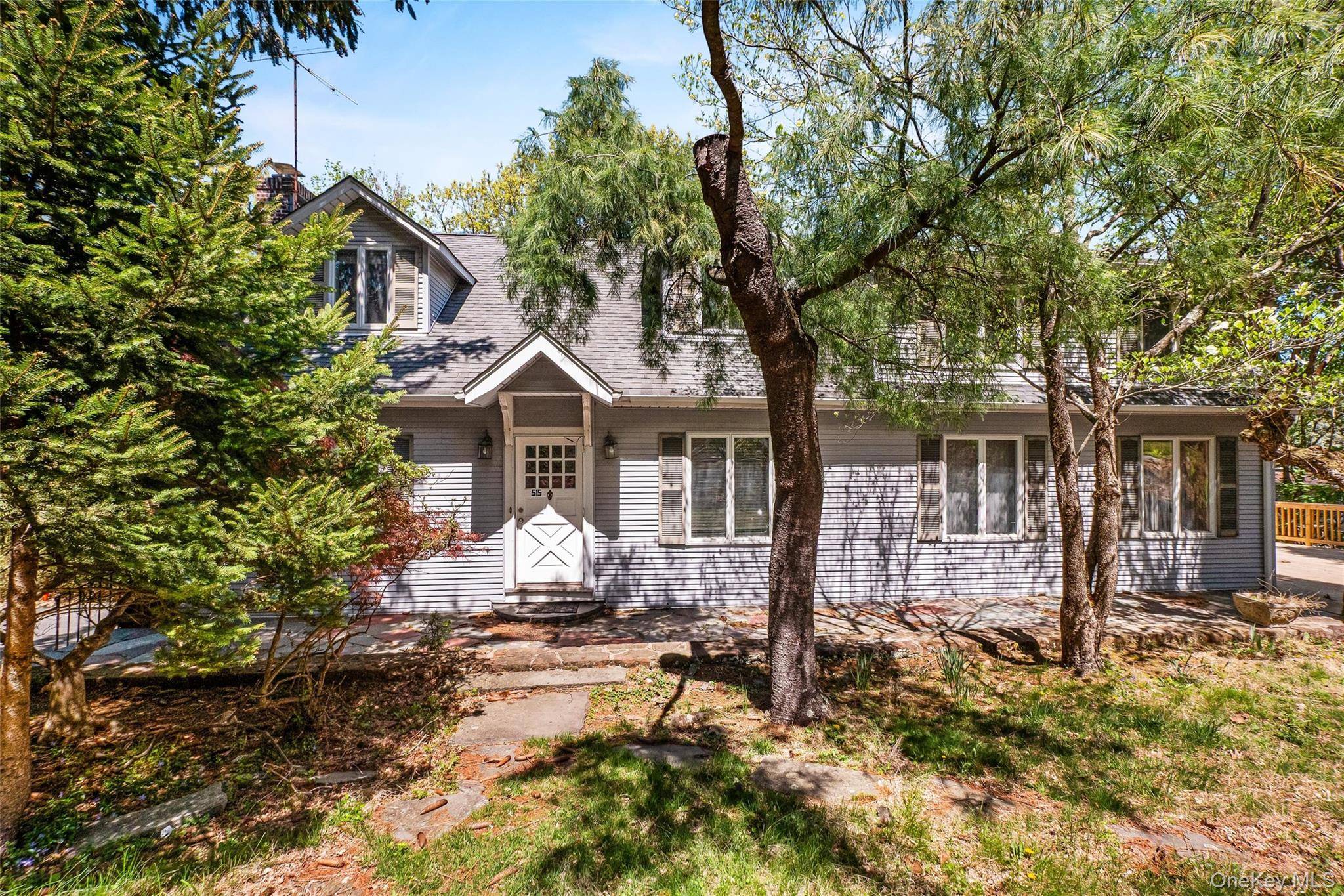 Spacious 4 Bedroom Colonial in Exclusive Wooded Setting Welcome to this large and light filled 4 bedroom, 2.