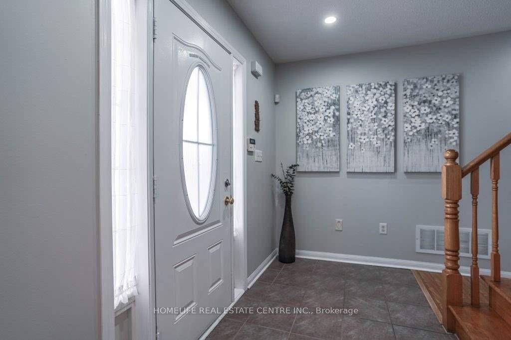 Stunning Upgraded 4 Bedroom All Brick Detached Home on a Rare Corner Lot !