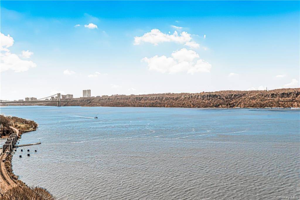 Indulge in breathtaking views of the Hudson River, Palisade Cliffs, and George Washington Bridge from this magnificent two bedroom sanctuary in the sky, boasting two full bathrooms and a private ...