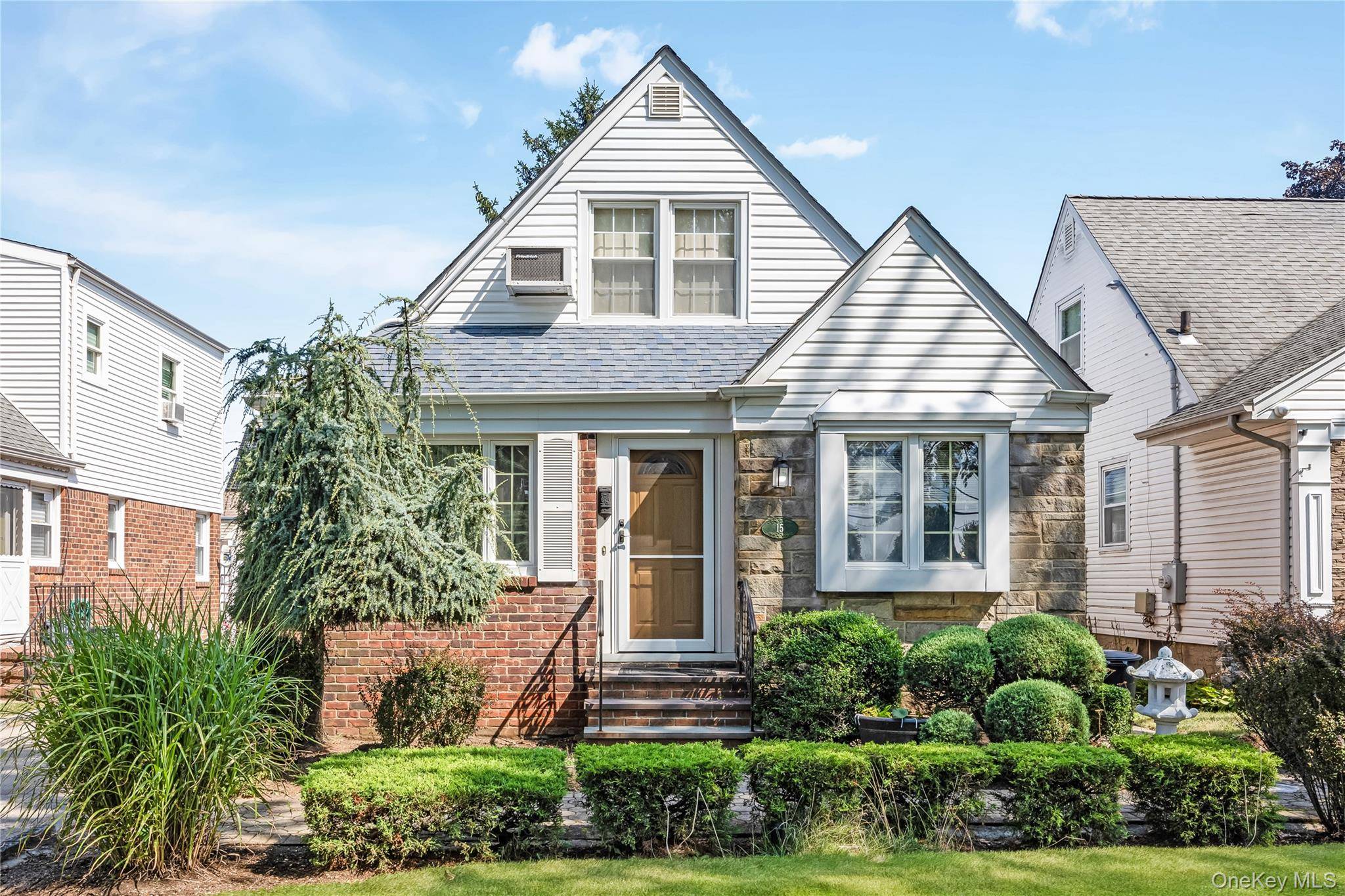 Lovingly and meticulously maintained dormered 4 bedroom, 2 bathroom brick Cape, abundant with charm and possibility, ideally located in the heart of the beautiful Village of Stewart Manor.