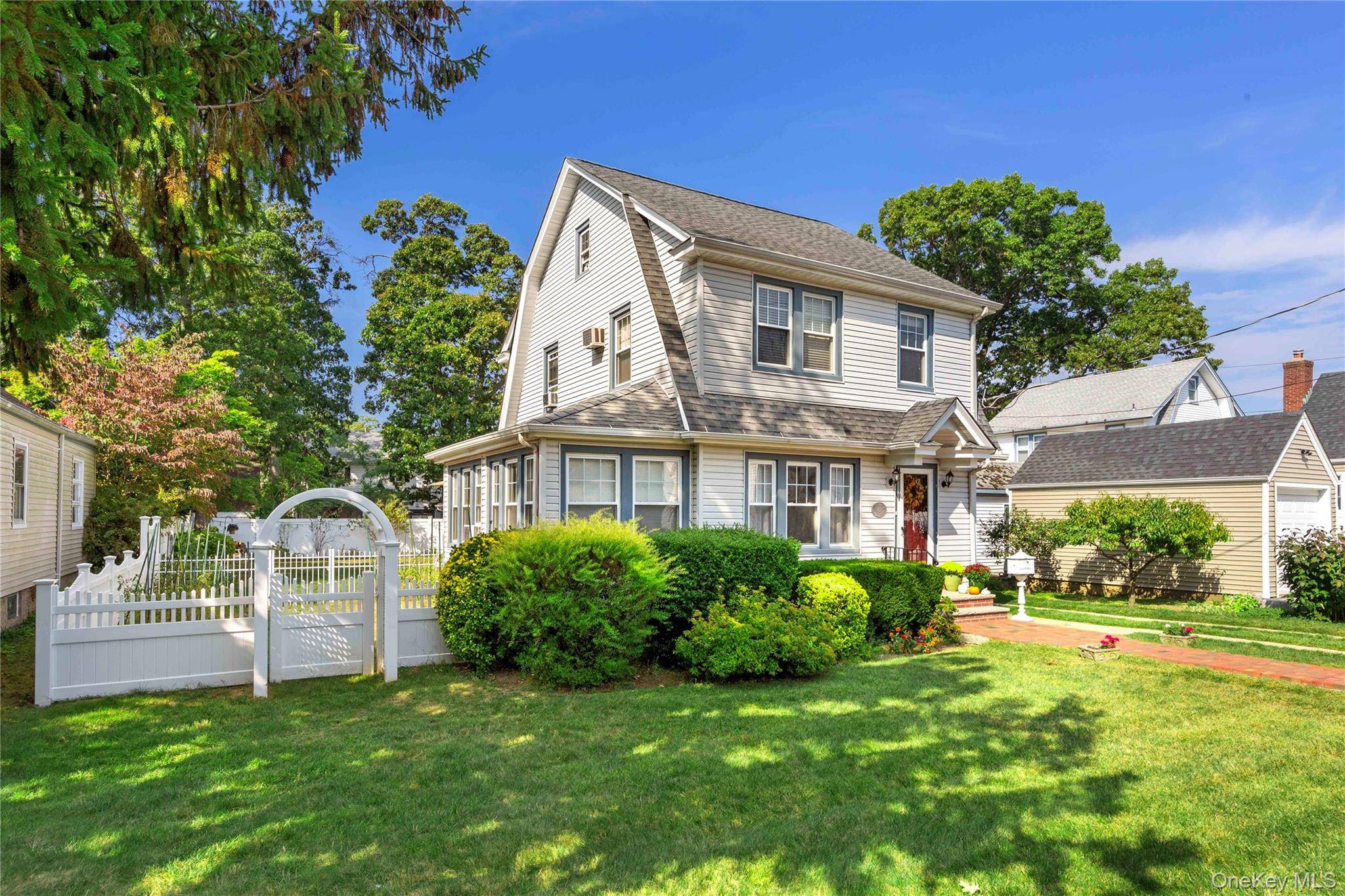 Lovely 1928 Colonial home located on a quiet tree lined street.