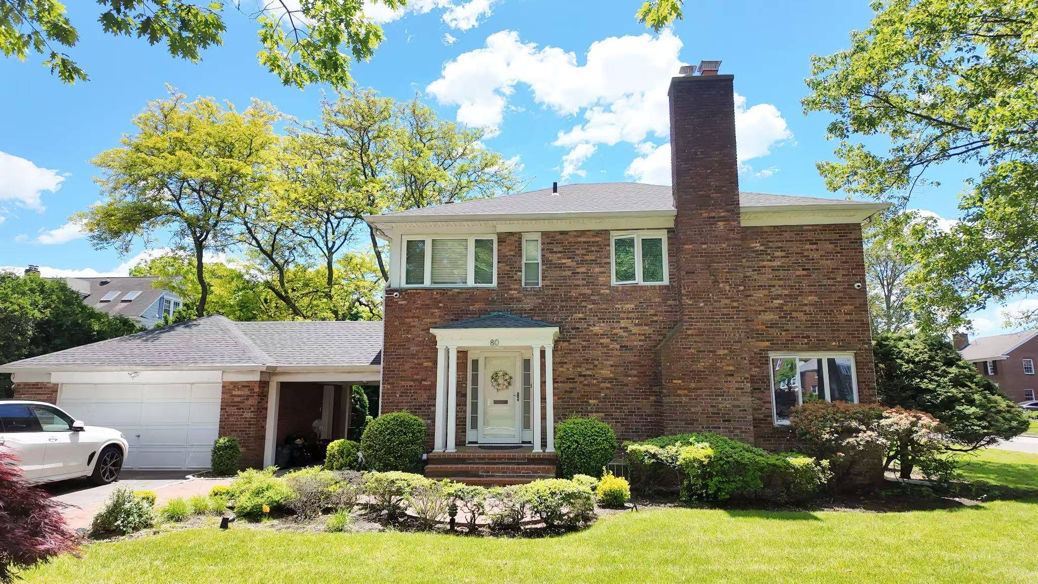 MOVE IN READY ! Spacious Brick Colonial in Prime Estate Section on 110 x 110 Gorgeous Landscaped Property.