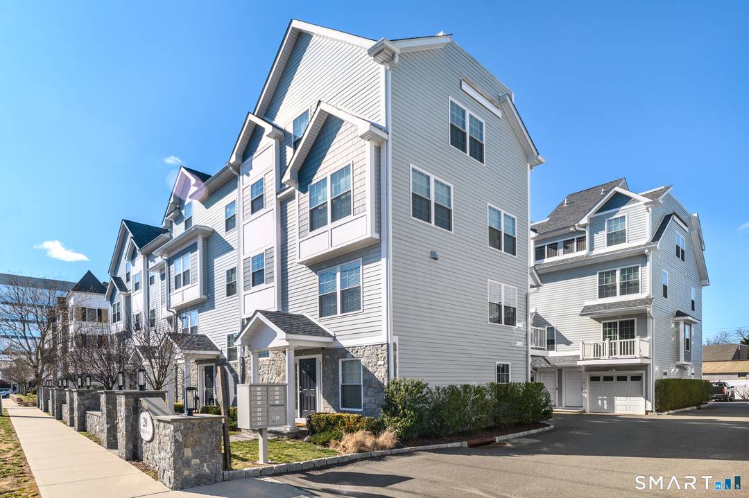 Step into this newer luxury townhouse in Mid City, Stamford.