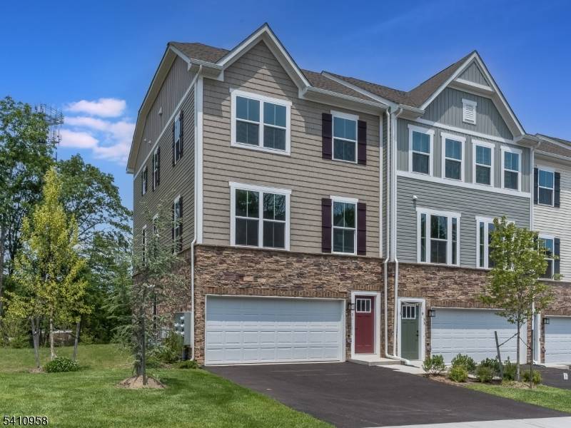 Welcome to this exceptional Shubert model end unit townhome in the sought after Mountain Ridge Community, where style, comfort and convenience come together seamlessly.