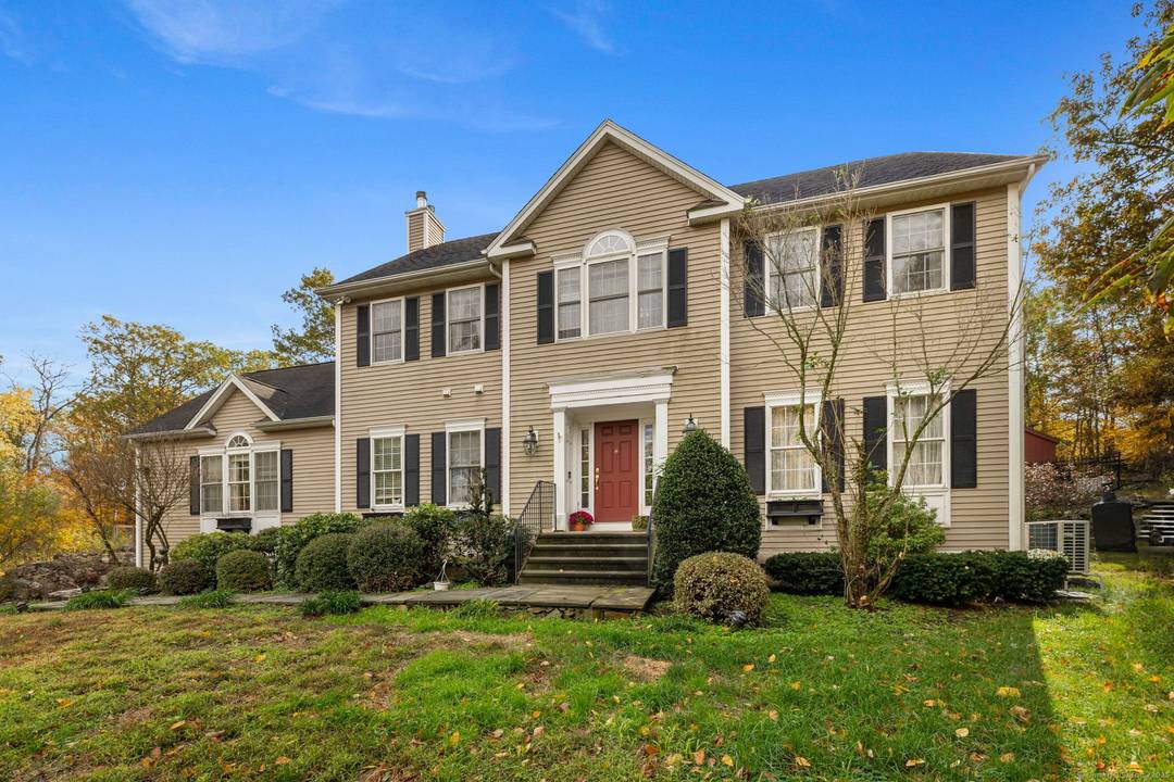This traditional Newtown Colonial delivers space, quality, and versatility.