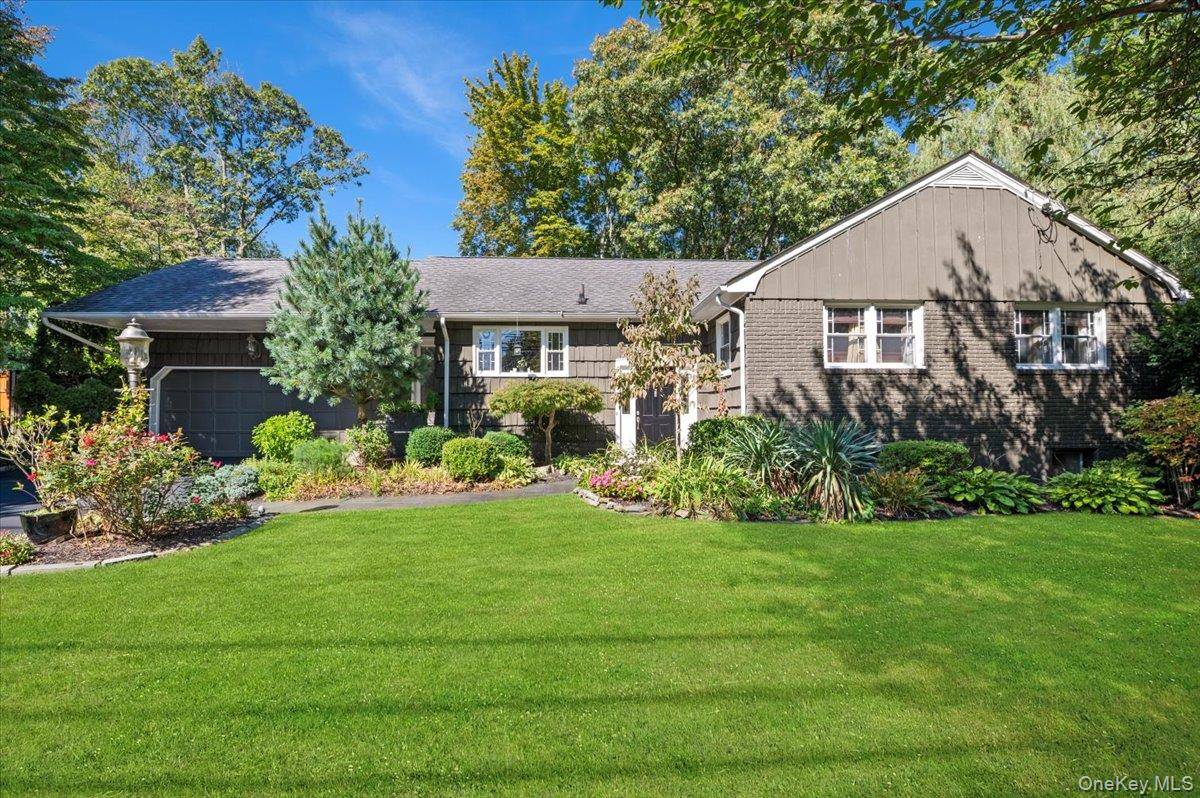 Welcome to your dream Split Level home in the heart of Huntington, Long Island !
