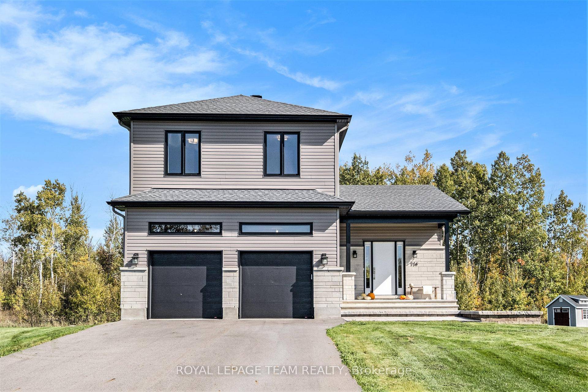 Welcome to 114 Maplestone Drive, a stunning contemporary home built in 2022 by Moderna Homes, perfectly blending modern design with quality craftsmanship.
