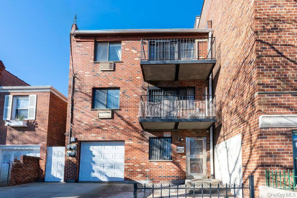 Welcome to this 3 family fully detached all brick home located in the heart of Elmhurst.