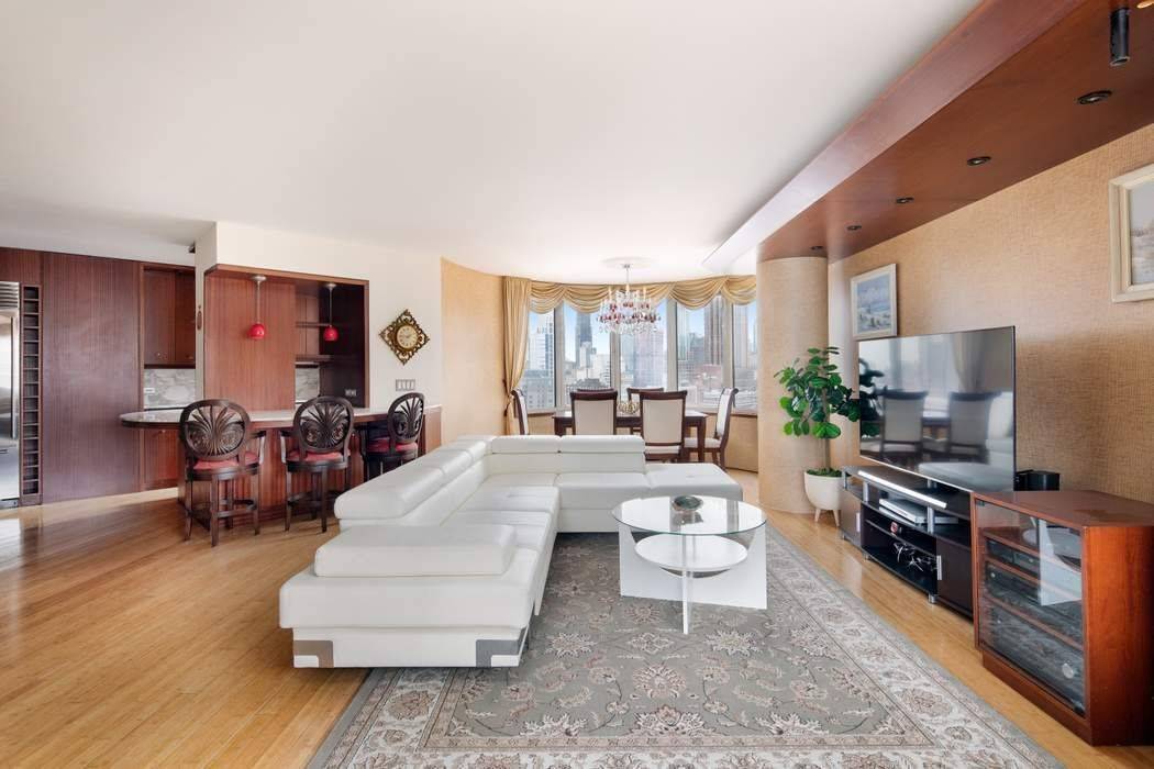 Spectacular two bedroom, two bath condo with panoramic views of the Manhattan skyline, Empire State and East River.
