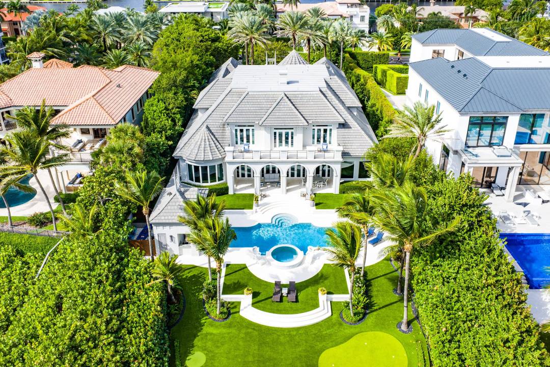 Spectacular appr 1 Acre Deep Estate Lot, Like New and Furnished Direct Oceanfront Gated Estate located in the Exclusive Town of Highland Beach.