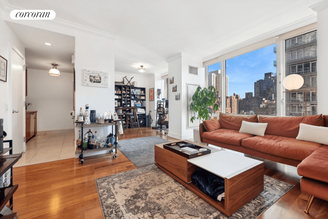 This sun filled and thoughtfully designed home offers floor to ceiling windows with classic city views and a flexible layout suited for modern living.