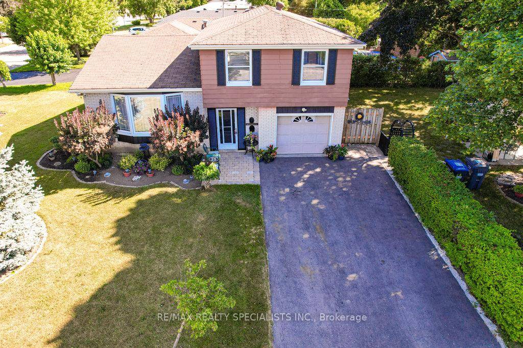 Welcome To This Beautifully Maintained 3 Level Side Split Family Home, Sitting Proudly On A Well Landscaped Corner Lot.