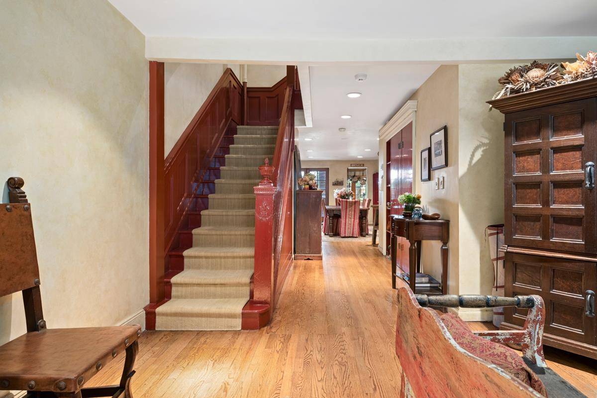Nestled on a picturesque, tree lined block in the heart of Manhattan's Upper West Side, this classic New York City townhouse offers a blend of timeless elegance and modern comfort.