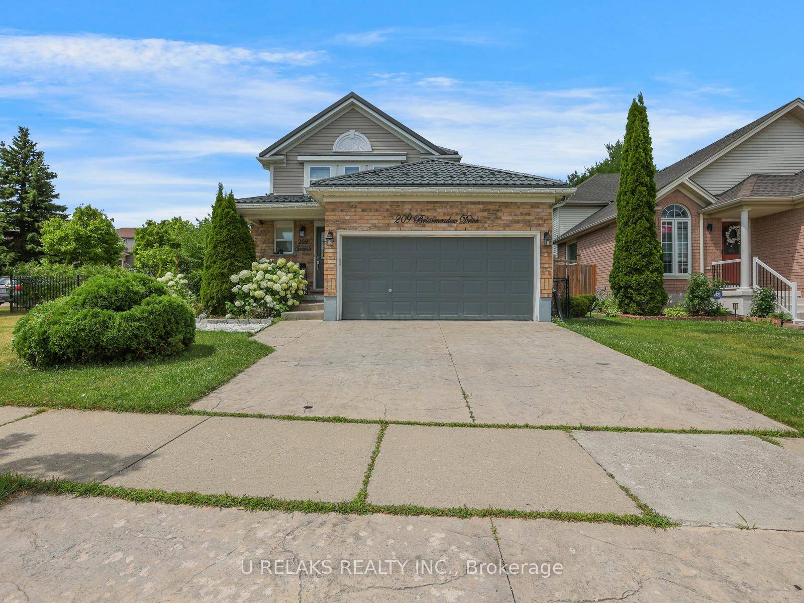 In the heart of Kitchener, welcome to 209 Briarmeadow Dr.