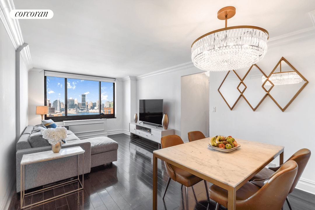 Set high on the 32nd floor of Liberty Court, this three bedroom, two bathroom residence offers sweeping, unobstructed views and a thoughtfully updated interior.