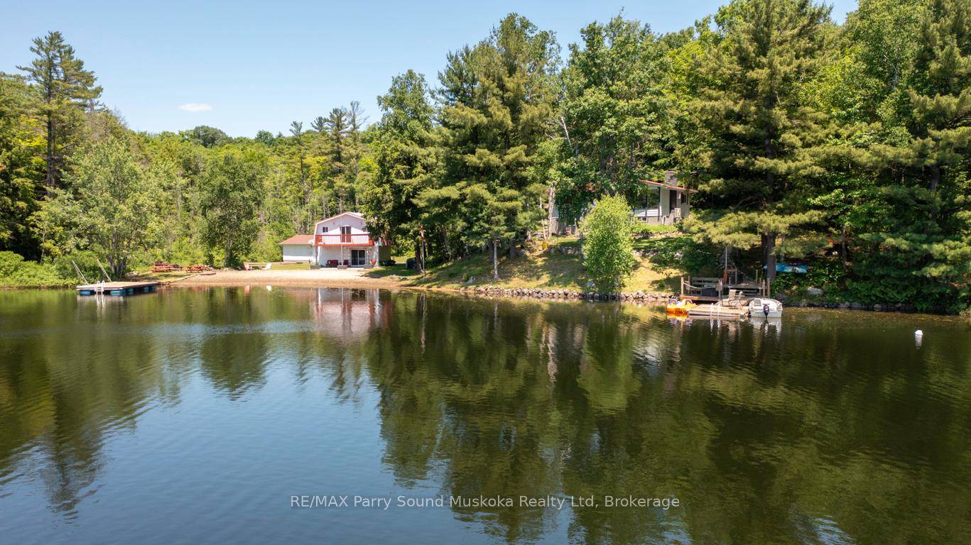OUTSTANDING 260 ft SOUTH FACING WATERFRONT on SPRING FED RANKIN LAKE !