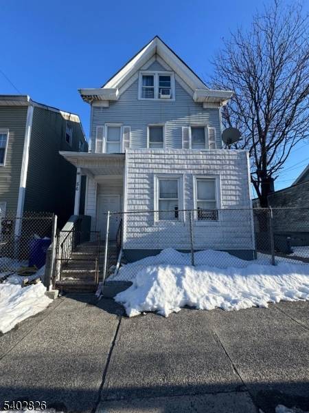 Recently Renovated Four Family Home Fully Rented Residentially Located Features Hardwood Floors, Central Air much more Low Property Taxes