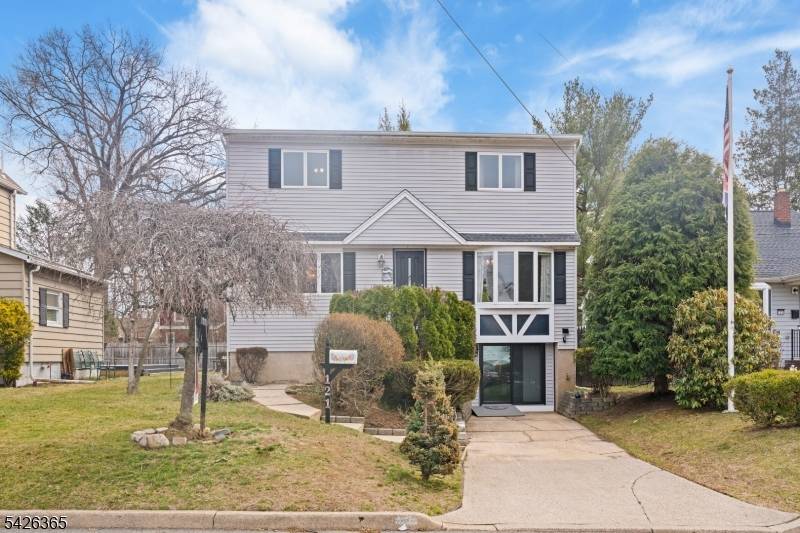 Beautifully maintained 4 bedroom, 3 bathroom expanded Colonial Cape, ideally situated in one of New Milford's most peaceful and desirable neighborhoods, right on the border of Oradell.
