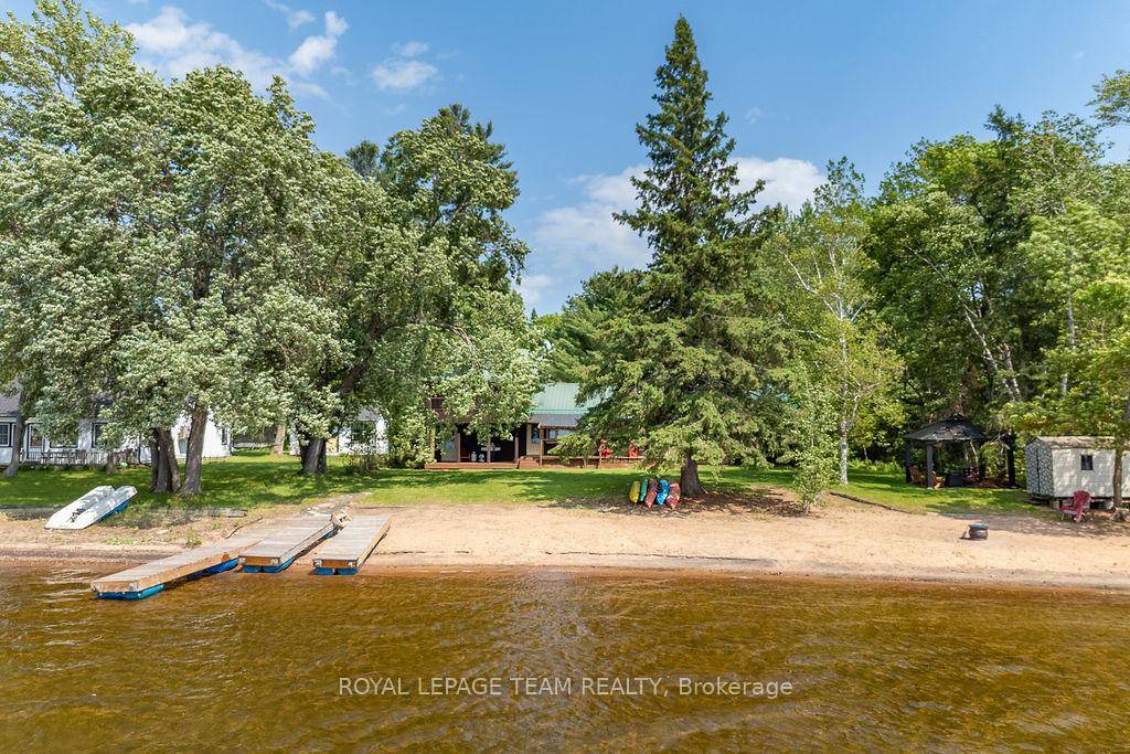 Discover your dream retreat at this stunning four season home on Kamaniskeg Lake, just moments south of Barry's Bay.