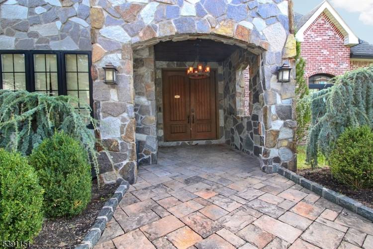 Perched high above the skyline with sweeping panoramic views, this striking young luxury home captures the essence of modern elegance and effortless indoor outdoor living.