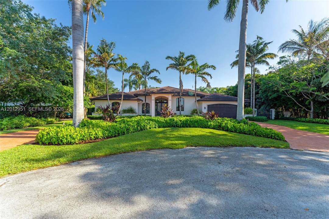 Tucked at the end of a quiet cul de sac in the desirable Sharon Estates, this stunning 4 bedroom, 3.