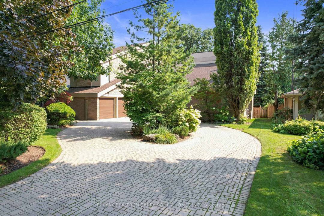 Architecturally Significant Contemporary Residence Nestled In The Prestigious Windfields Neighbourhood.