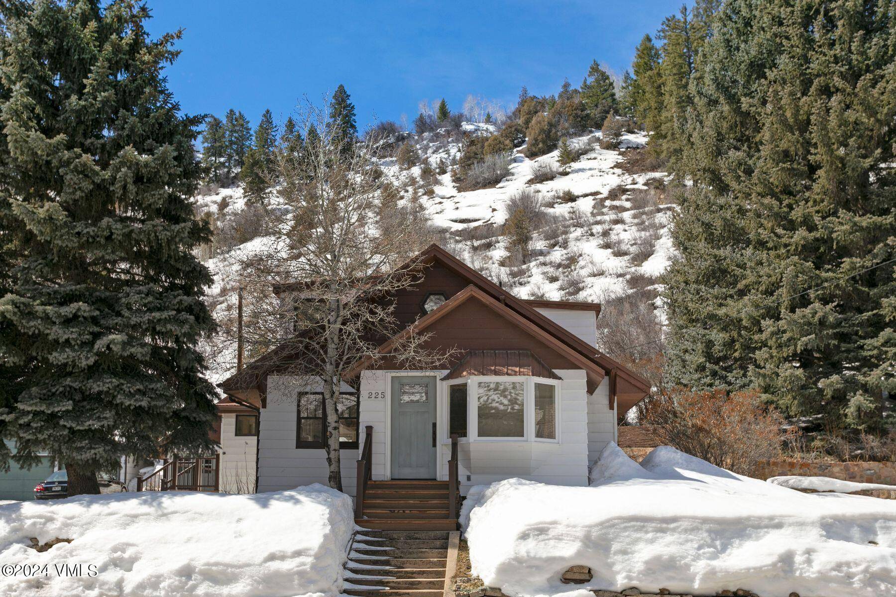 A fantastic location in Minturn, 225 Pine Street is ideally situated on a large lot across the street from the community garden and a very short walk to Downtown.