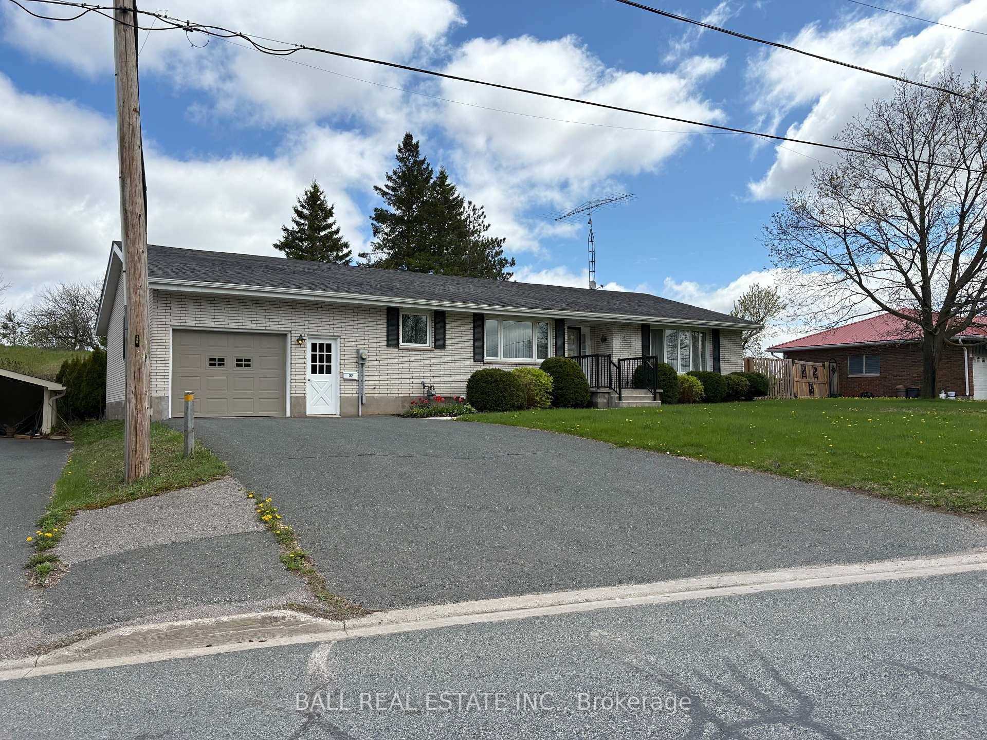 All brick bungalow on large lot close to all amenities.