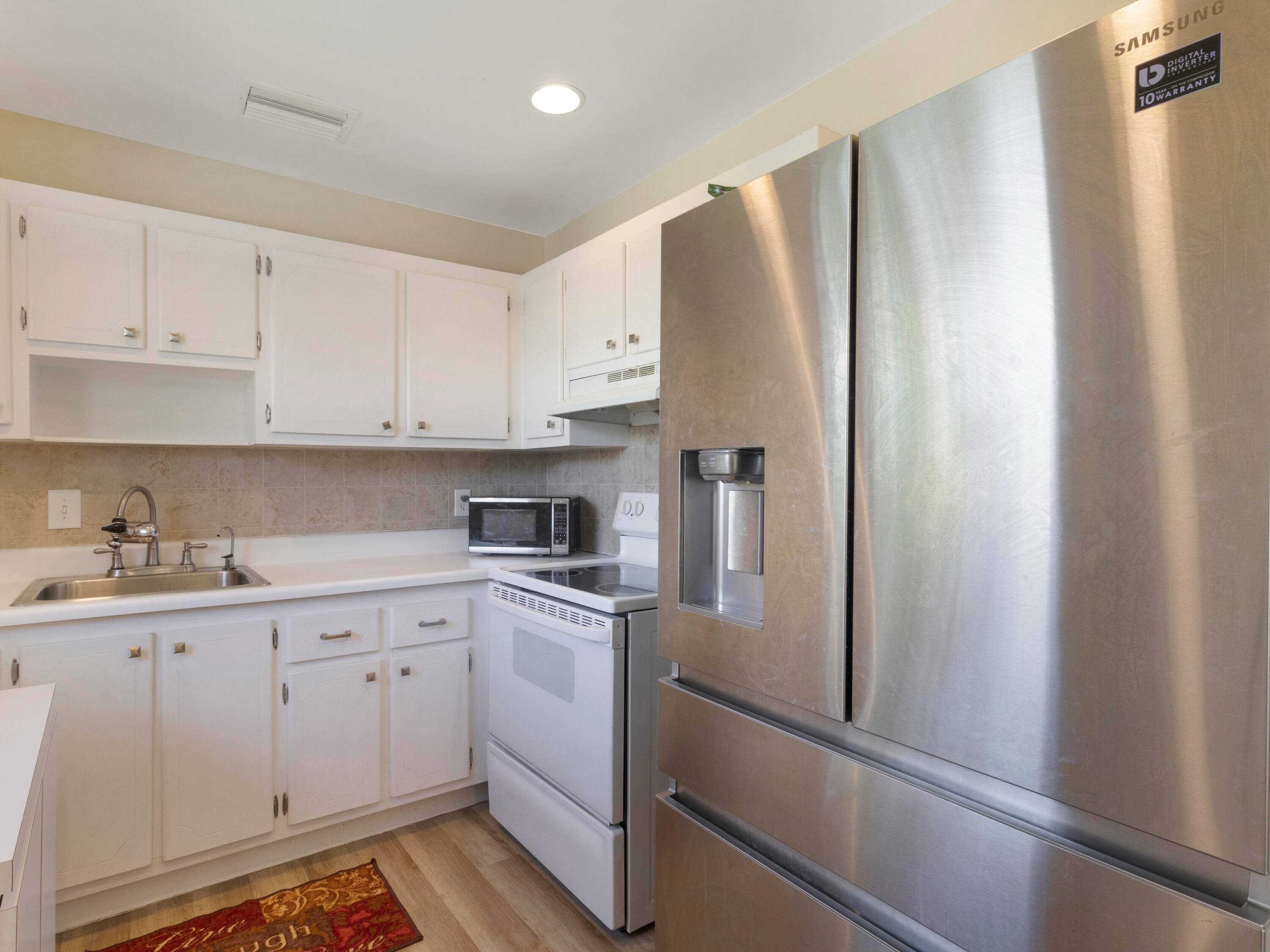 Step into this beautifully maintained 2 bedroom 2 bath condo featuring updated bathrooms, crown molding, and vinyl flooring throughout.