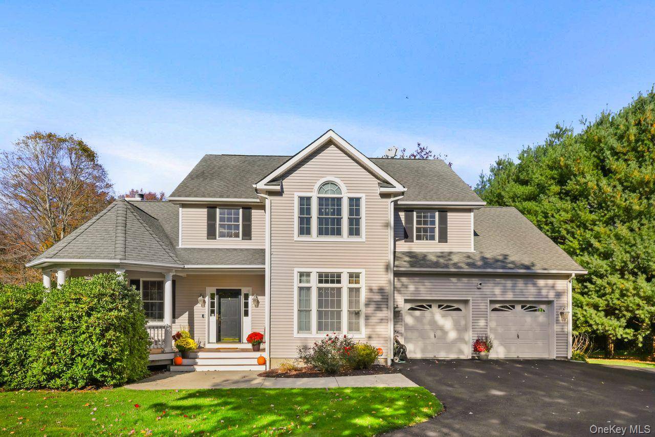 Elegant and Updated Center Hall Colonial, ideally situated in The Highlands a beautiful and highly sought after neighborhood in the charming Town of Pawling.