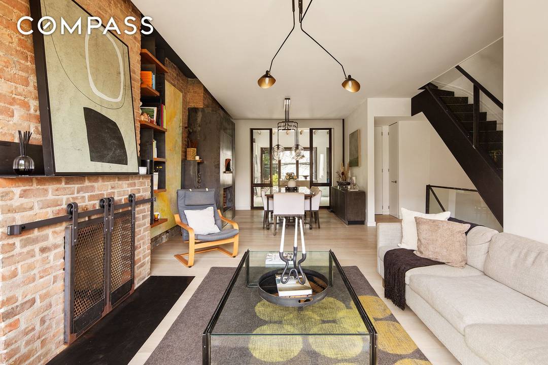 Welcome to 47 Wolcott Street, a beautifully renovated townhouse offering 4 bedrooms and 3.