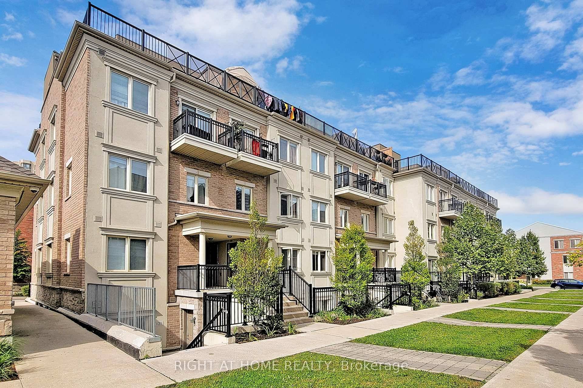 Stunning End Unit Urban Townhome Features 2 Large Bedrooms Both With Access To Private Terrace Den.