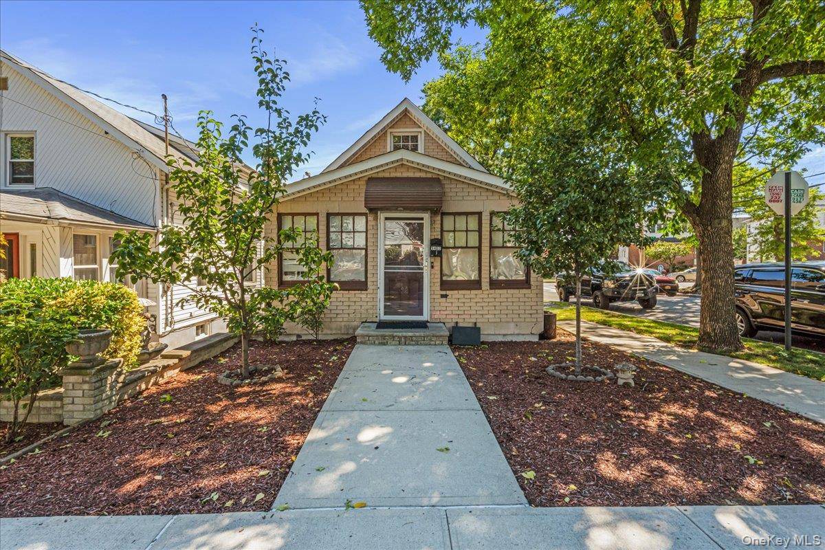 Welcome to this charming two bedroom, two bath bungalow nestled in the heart of South Ozone Park, New York.