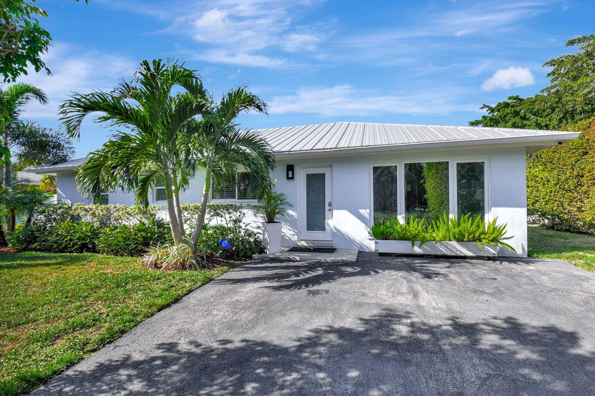 Nestled on a spacious corner lot in a desirable East Delray neighborhood, this beautifully remodeled 3 bedroom, 3 bath pool home offers the perfect blend of modern upgrades, timeless charm, ...