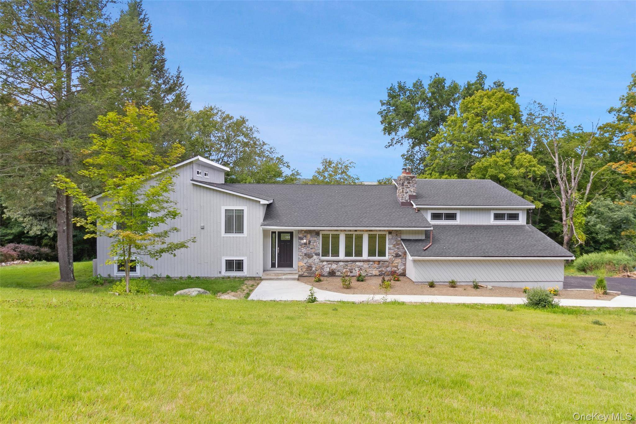 Welcome home to this updated contemporary split level !