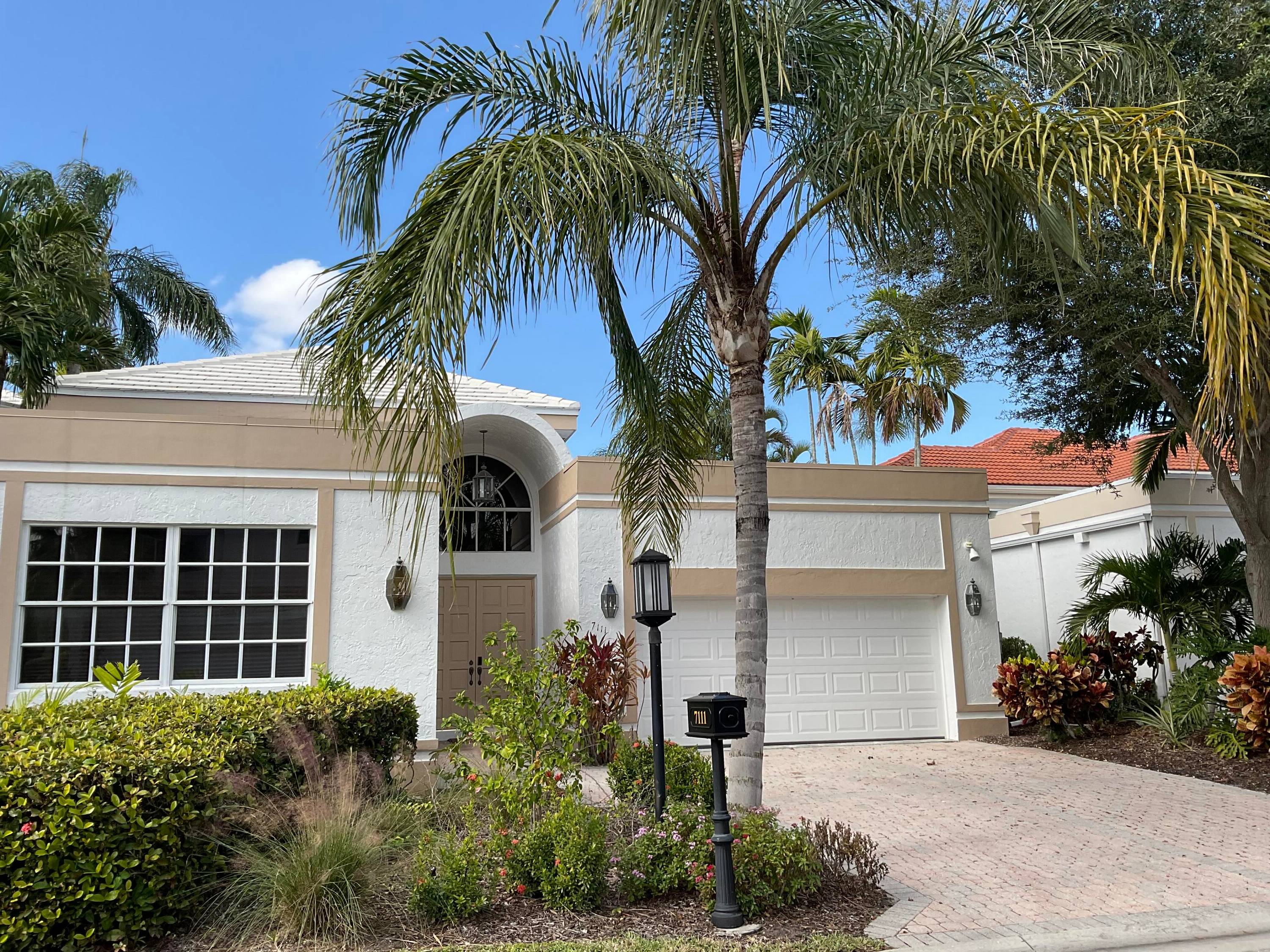 Smashing modern boutique style 3 bedroom home in Boca Groves prestigious members only golf, and country club community, with soaring ceilings, wide open design, recently elegantly renovated, streaming natural light, ...