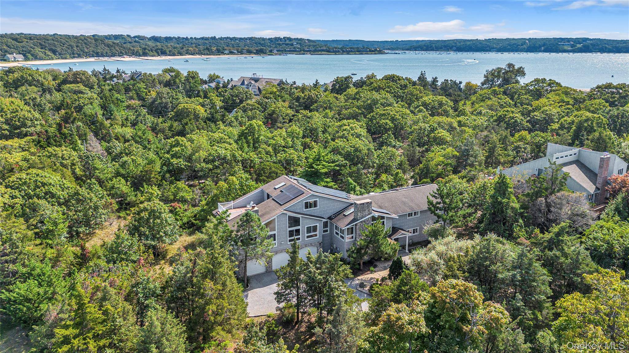 Experience coastal living in this breathtaking 3 level contemporary style home, perfectly positioned on a private Cul De Sac in The Incorporated Village of Asharoken, just steps from its own ...