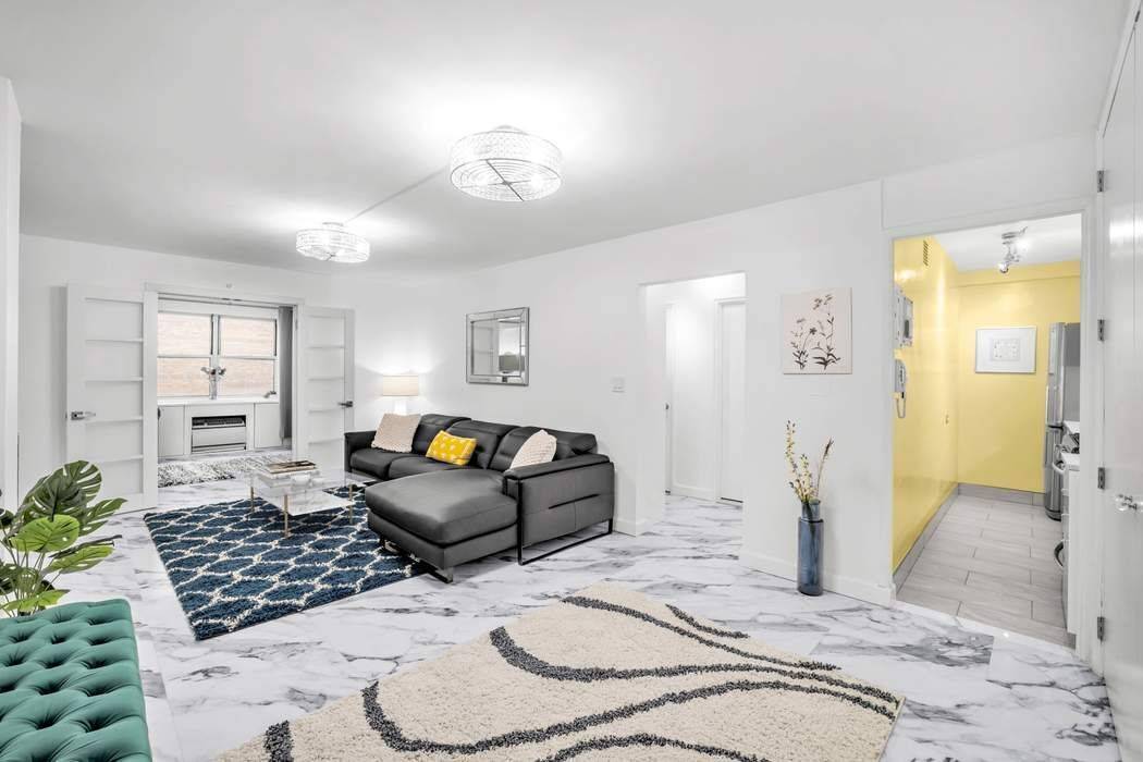 This bright and quiet, oversized residence is in spotless condition.