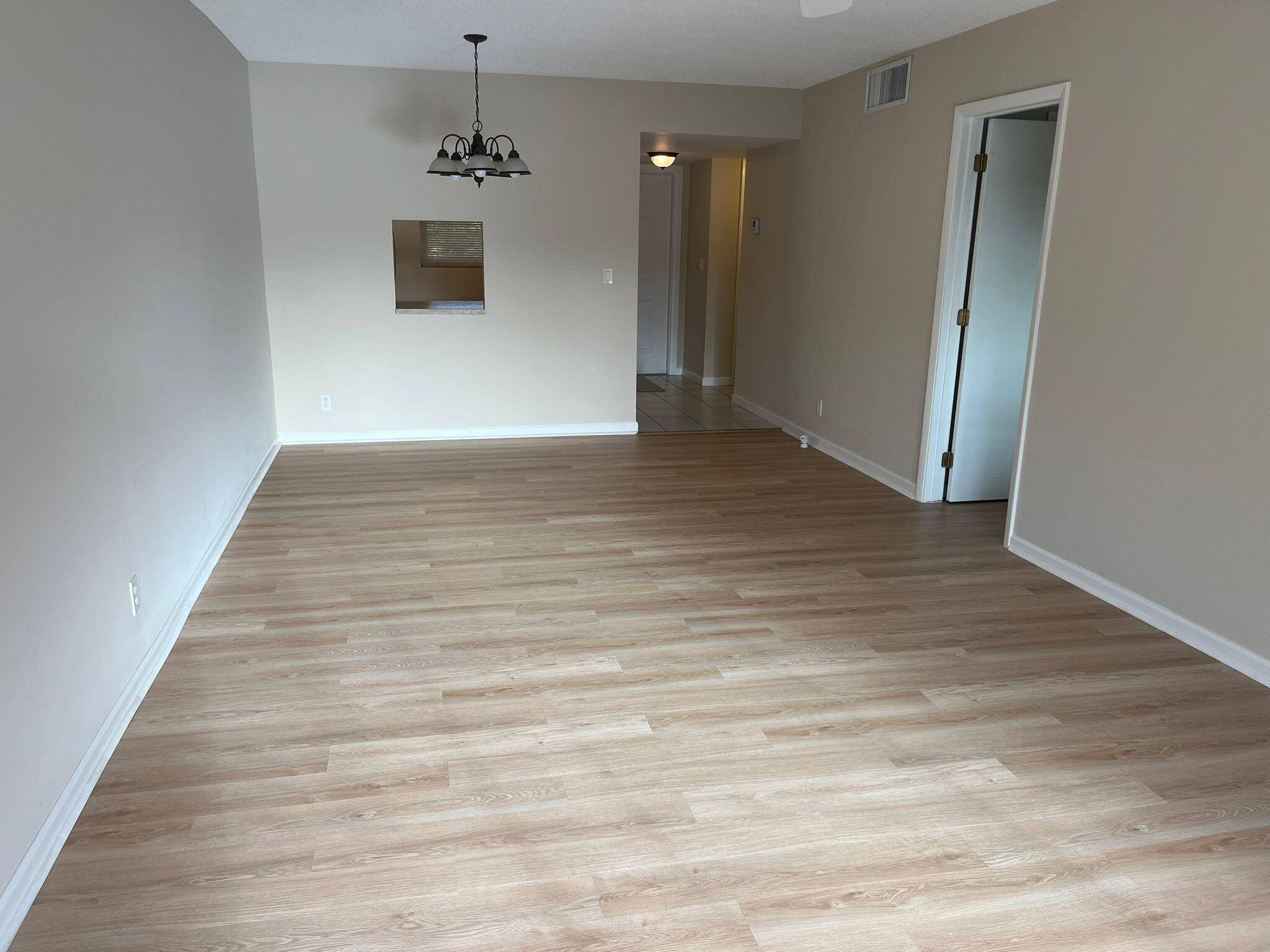 This newly renovated unit features IMPACT WINDOWS.