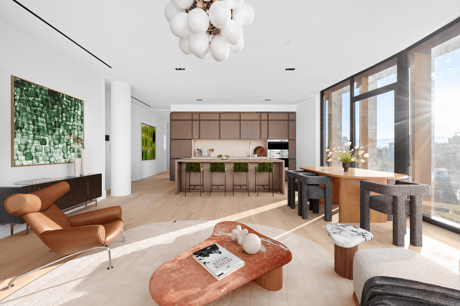 A Corner Three Bedroom with Dramatic Light and Skyline Views with Deeded Parking spot.