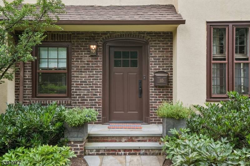 IDEAL SUMMIT LOCATION FABULOUS 1923 ENGLISH TUDOR Set on exceptionally private property in one of Summit's most desirable neighborhoods, yet just three short blocks to Summit's vibrant downtown, this home ...