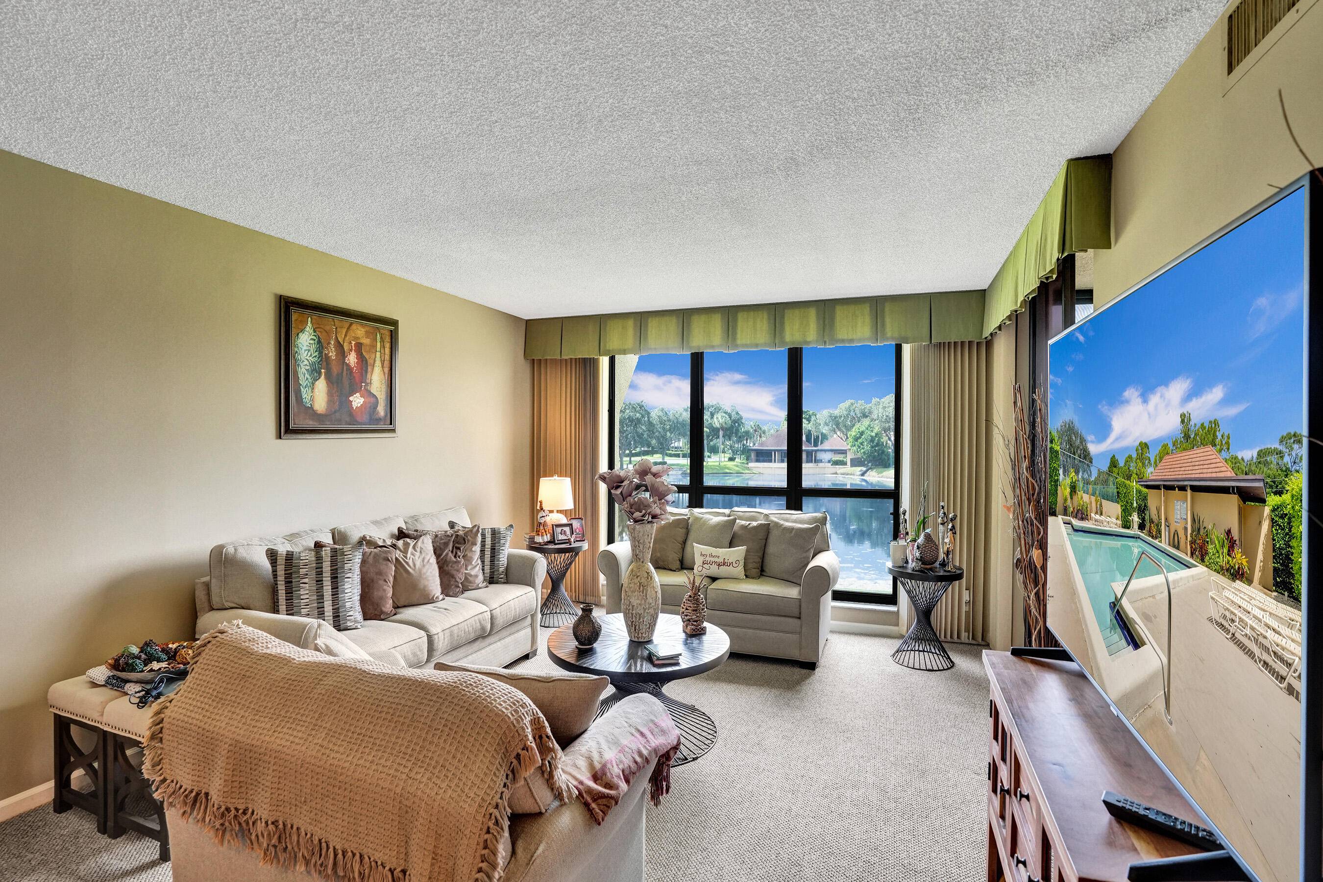Welcome to Woodland Lakes, a Premier 55 Community in Palm Beach Gardens, FloridaDiscover the perfect blend of comfort and convenience in this spacious, light filled condo located in the highly ...