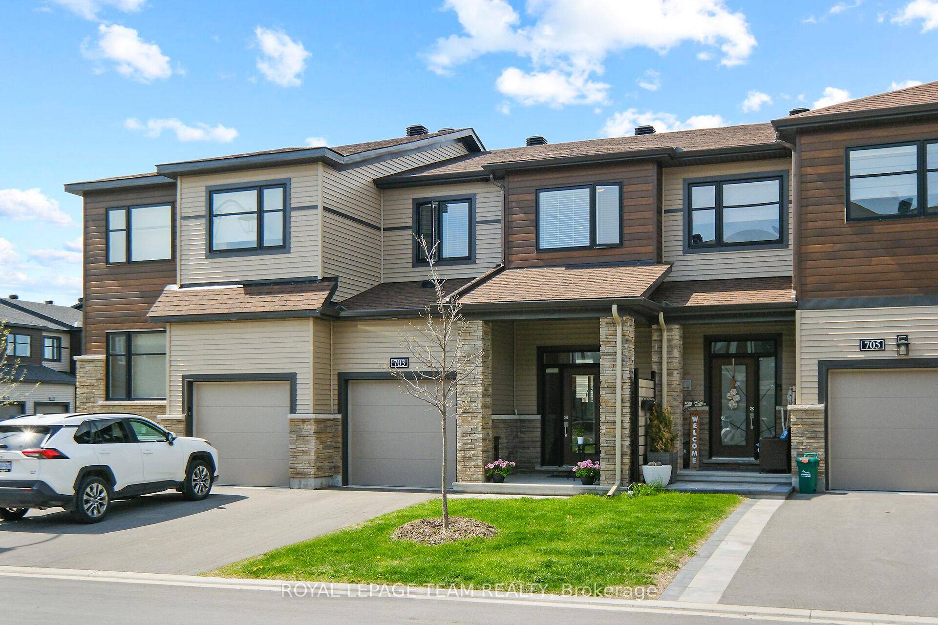 Step into modern living with this beautifully upgraded townhome in vibrant Quinn's Pointe community, featuring 3 bedrooms, 4 bathrooms, and a fully finished basement perfect for today's lifestyle !