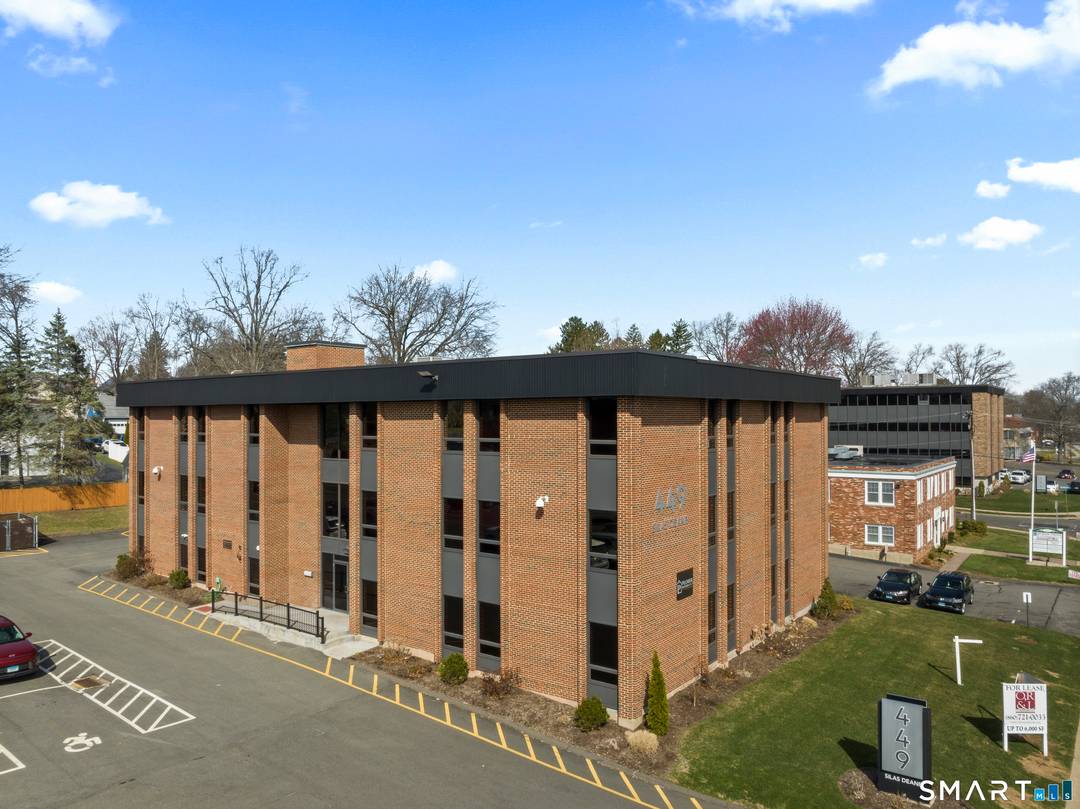 Well maintained, three story commercial office building located along the highly visible Silas Deane Highway corridor in Wethersfield.