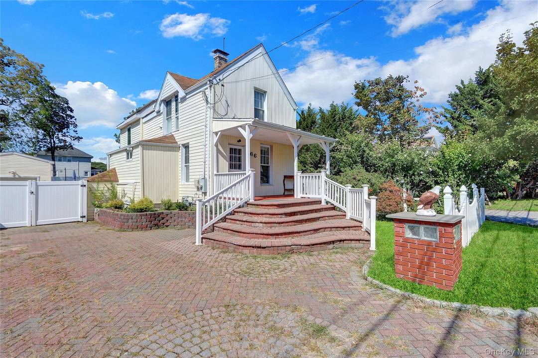 Airy and Bright Two Story 3 Bedroom 2 Bath House With Bedroom on First Floor.